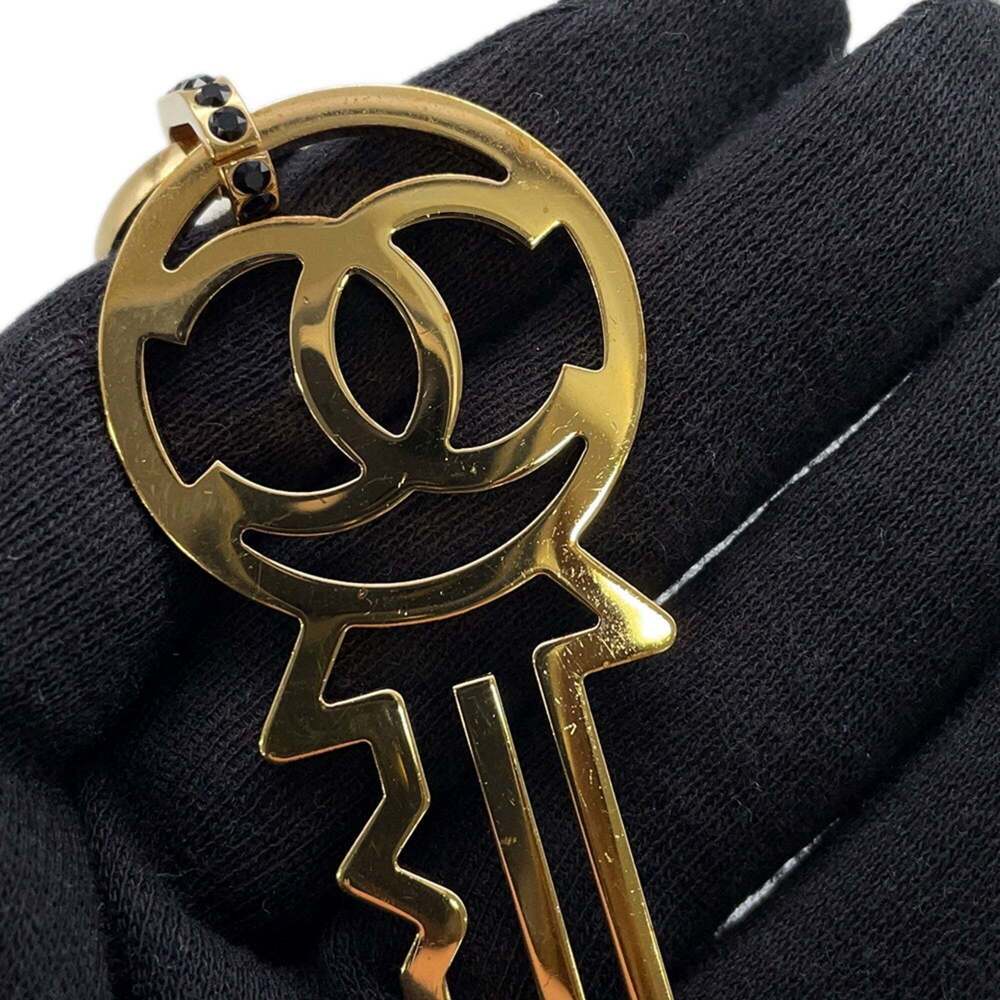 CHANEL Gold Logo Necklace - Picture 6 of 12